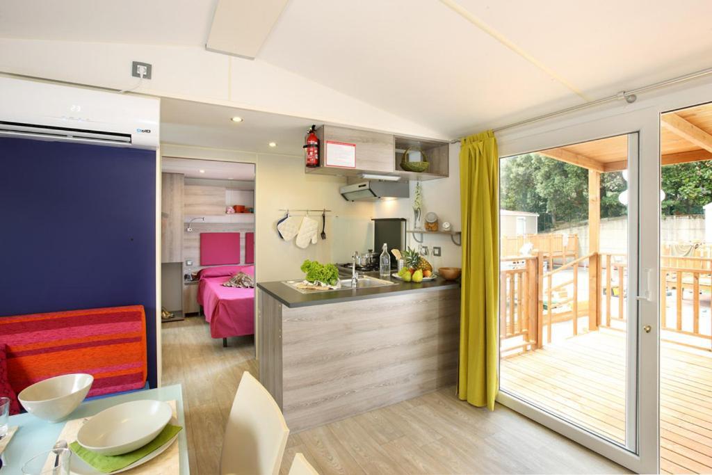 Отель Casa Mobile Gustocamp A Каорле Экстерьер фото